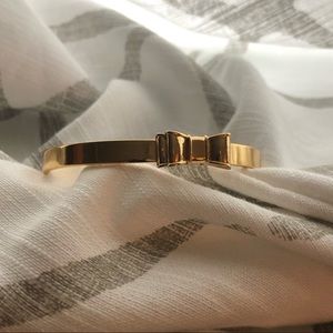 Kate Spade gold ribbon bangle- barely worn